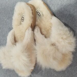 Ugg slipper size 7, new